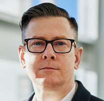 Alexander Hughes, CEO eines Krypto-Trading-Unternehmens, Porträt